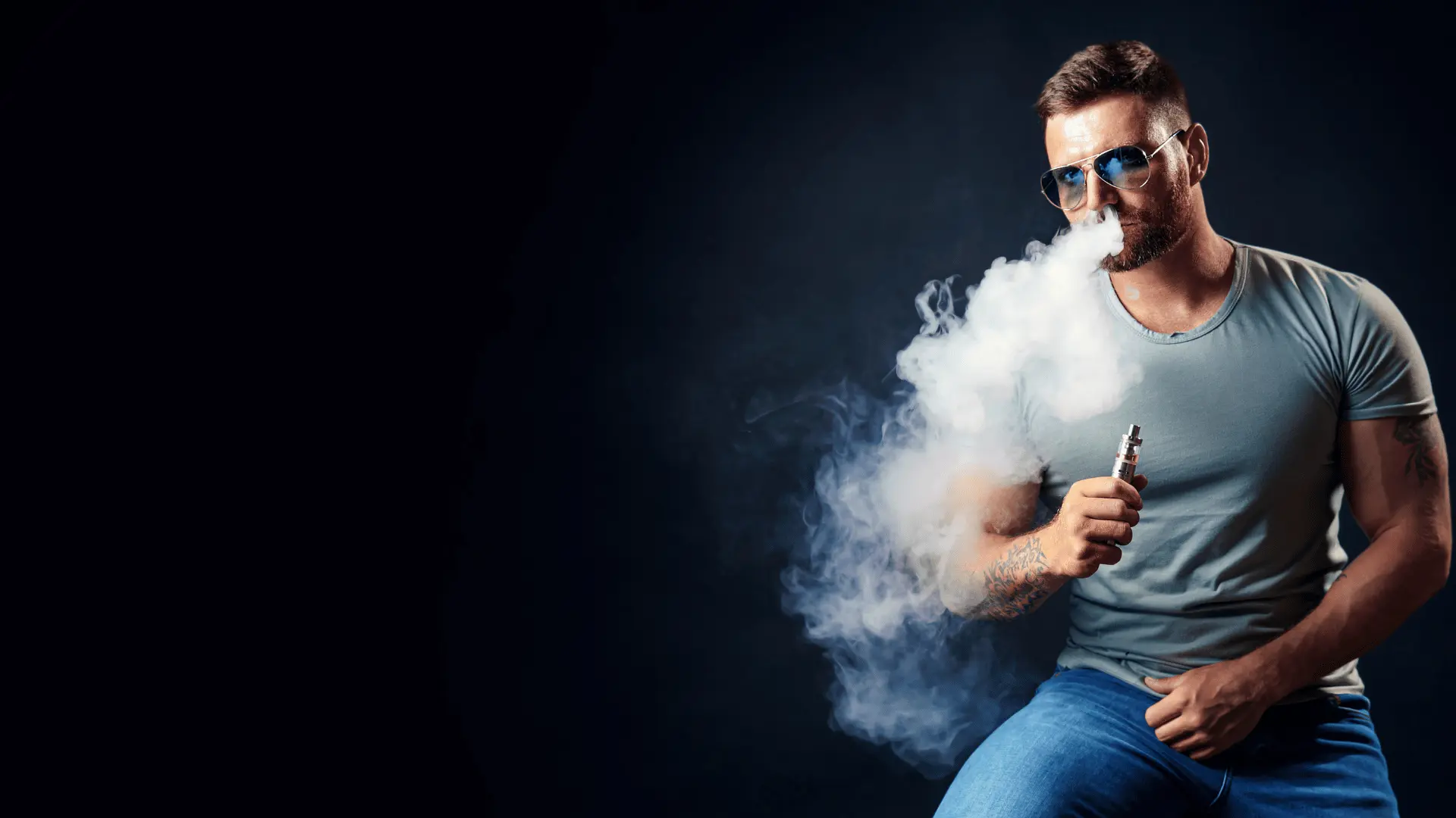 Guy smoking vape from vapedaddy vape distributors and wholesalers